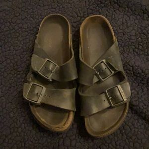 Birkenstock’s. Very used. Size 7-8